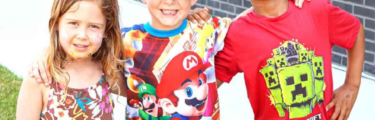 Three smiling children