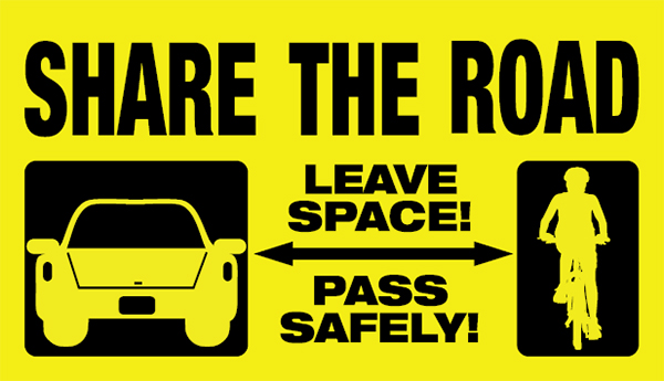 Sign of share the road to leave space for cyclist and pass safely