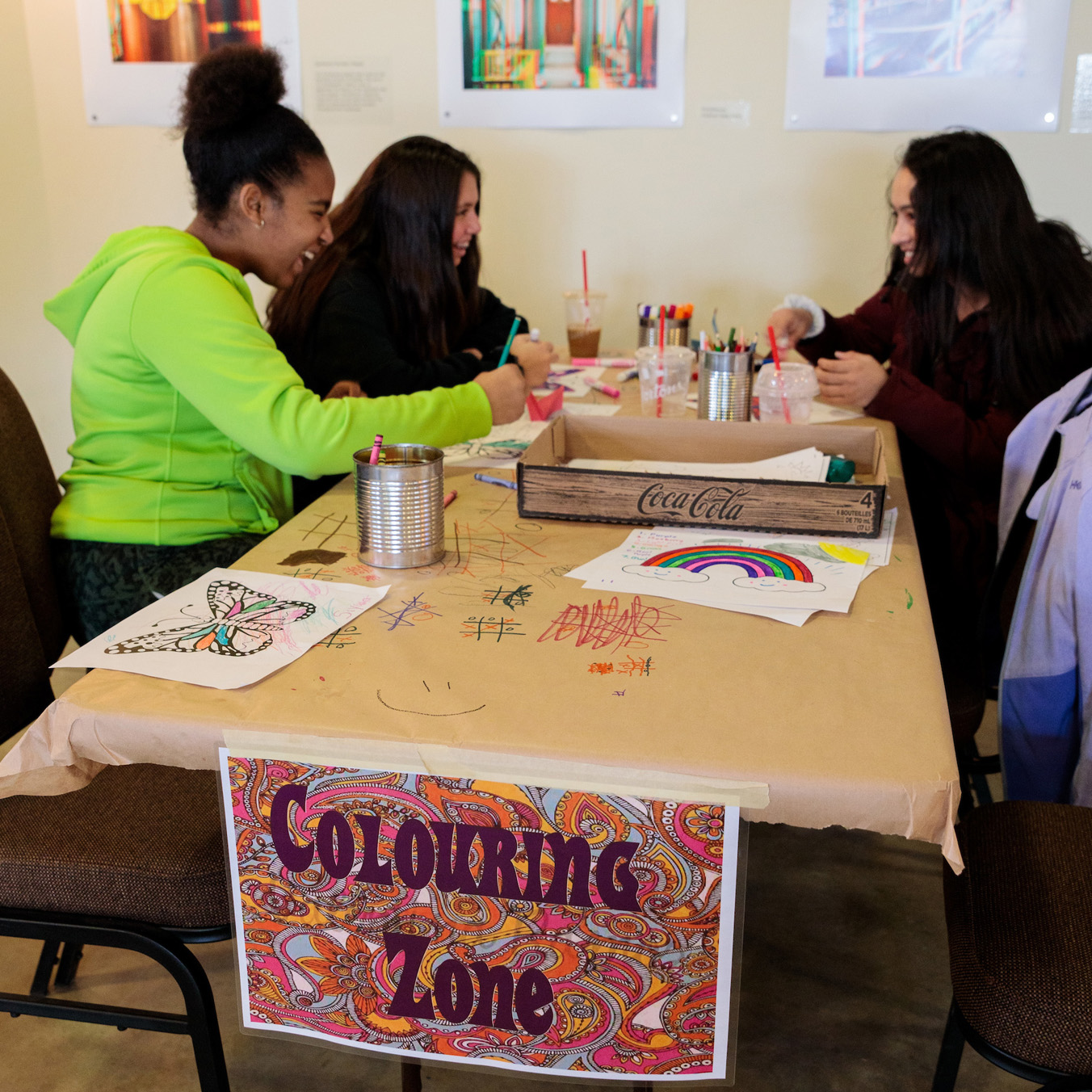 Teens painting crafts on table