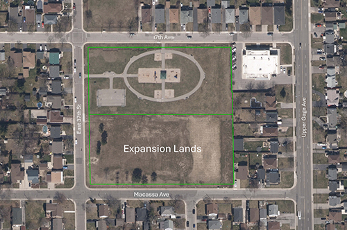 Aerial view of Vincent Massey Park with green outline around proposed expansion area