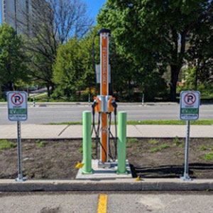 Charging station for city vehicles in parking lot