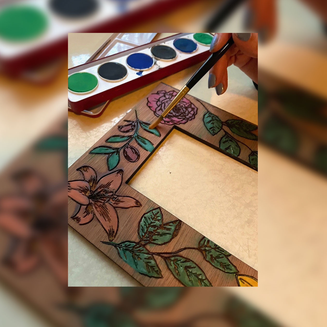 Example of pyrography painting at Whitehern Historic House & Garden