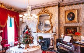 Formal room of historic Whitehern home decorated for Christmas holidays