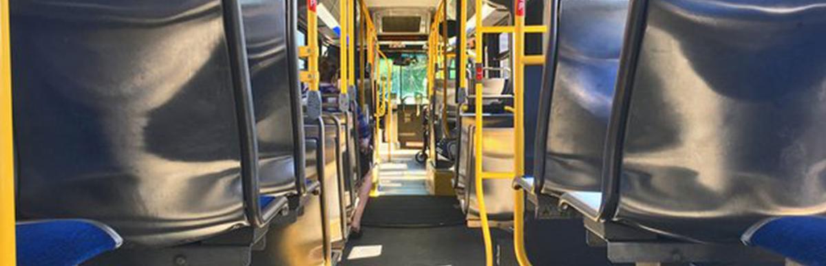 Inside view of aisle and seats of HSR bus