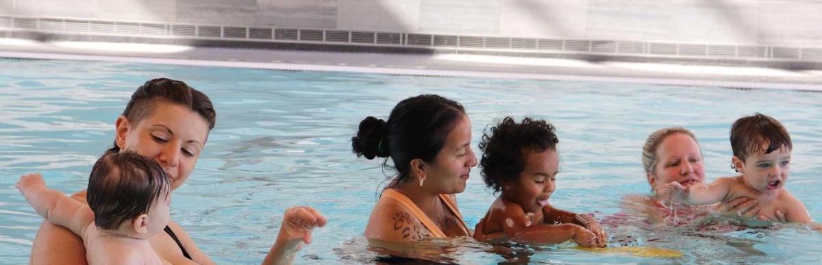 People swimming in an indoor pool at a Hamilton Recreation Centre