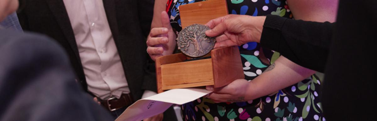 Arts Awards recipient with medal