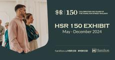 2 people standing in a room Text:"HSR 150 Exhibit May - December 2024"